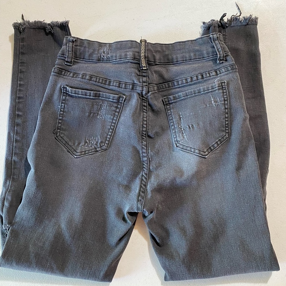 High waisted distress jeans